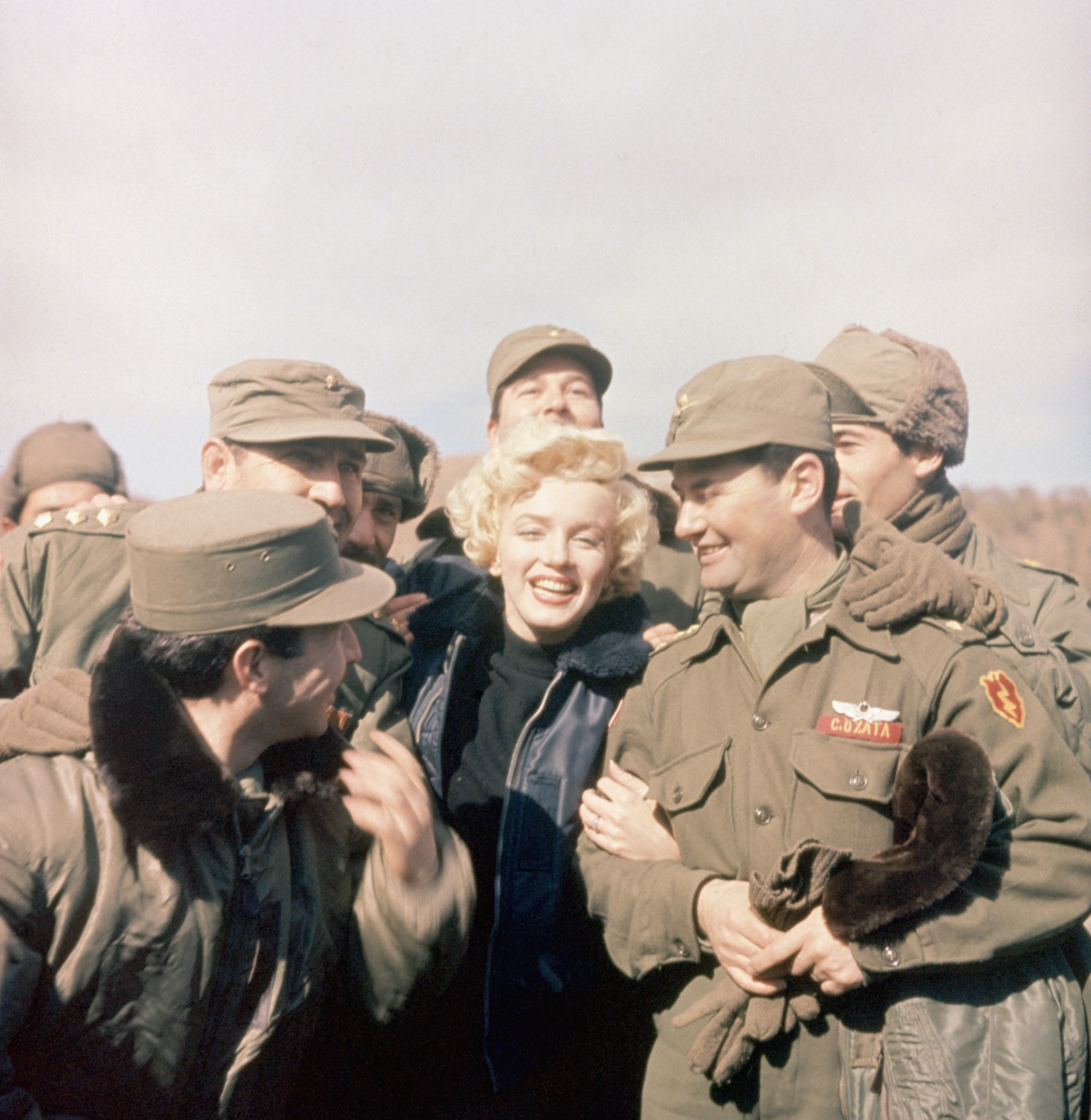American movie actress Marilyn Monroe entertains a group of soldiers in Korea. 1950/Bettmann/Getty Images