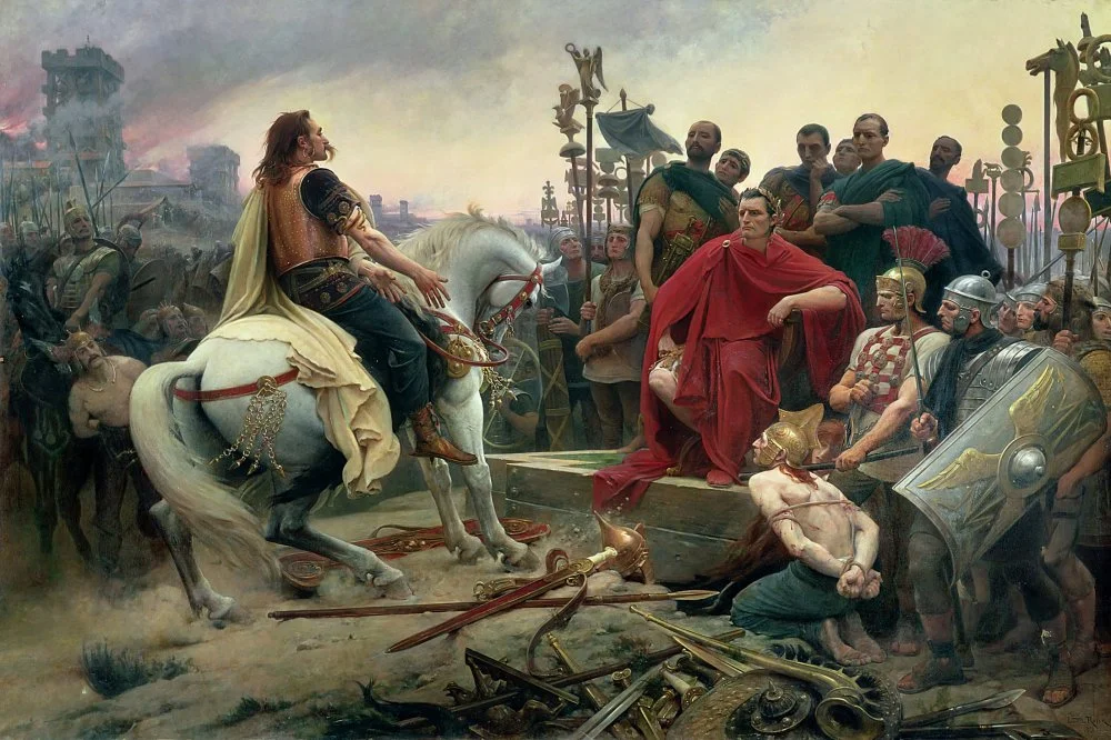 Lionel Royer. Vercingetorix throwing down his weapons at the feet of Julius Caesar. Musée Crozatier in Le Puy-en-Velay. 1899/Wikimedia Commons