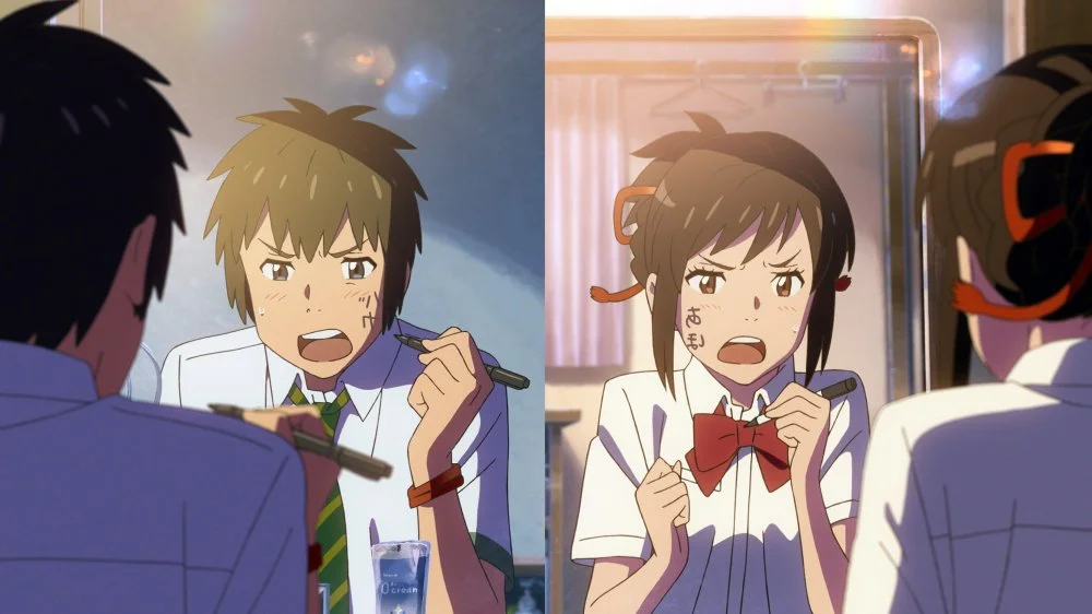 Taki and Mitsuha switch bodies. Your Name (Kimi no na wa, 2016 Japanese Director: Makoto Shinkai)/Makoto Shinkai Animation/Alamy