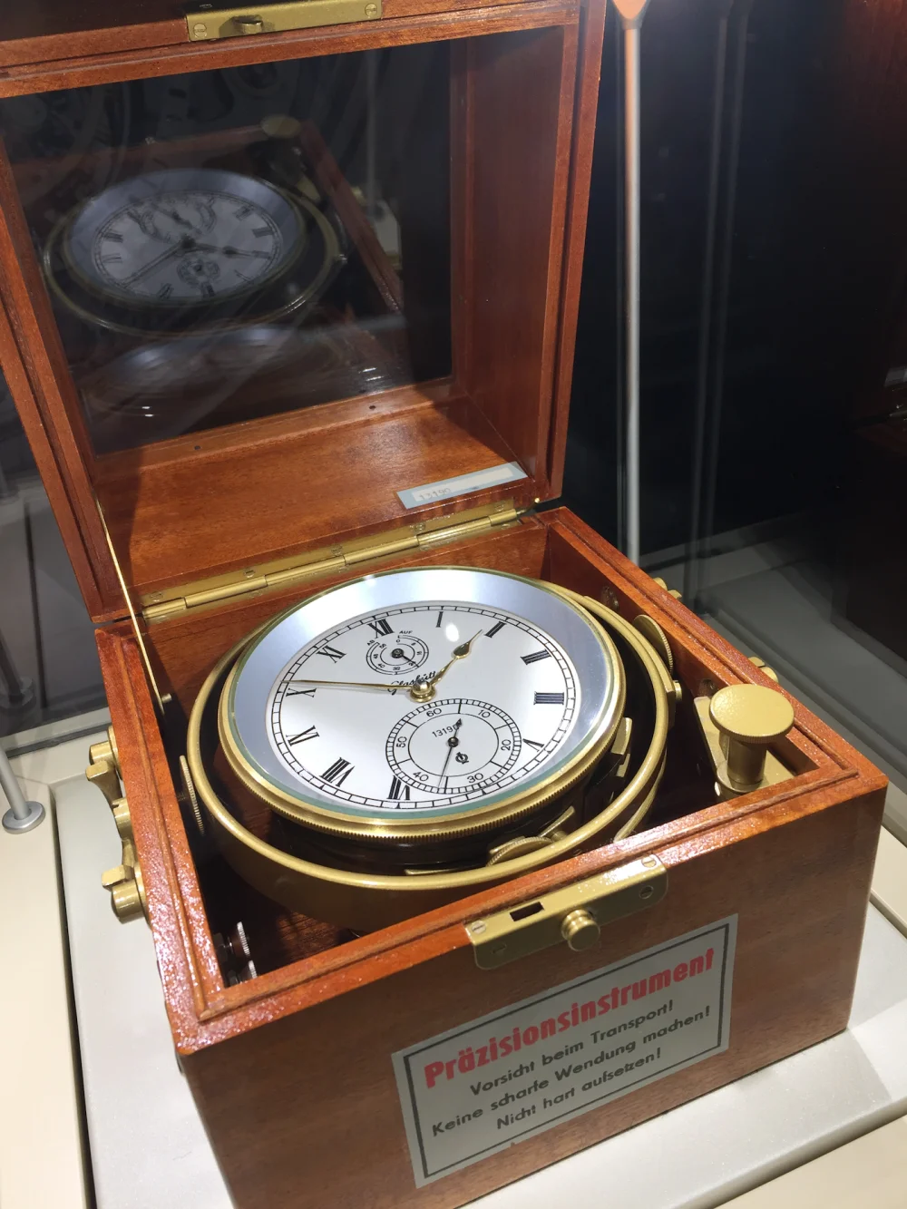 A ship's chronometer, housed in a wooden case and mounted on a suspension designed to level out the effects of sea rolling, is part of the museum collection from the brand Glashutte Original / A. Tarkhanov