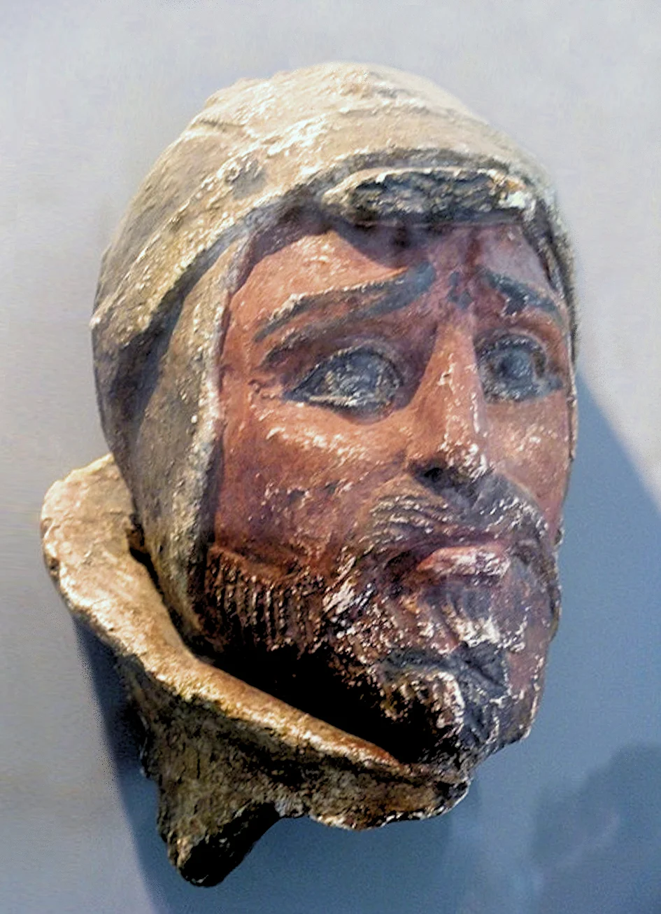 Head of a Saka warrior, as a defeated enemy of the Yuezhi, from Khalchayan, northern Bactria, 1st century BC / Wikimedia commons