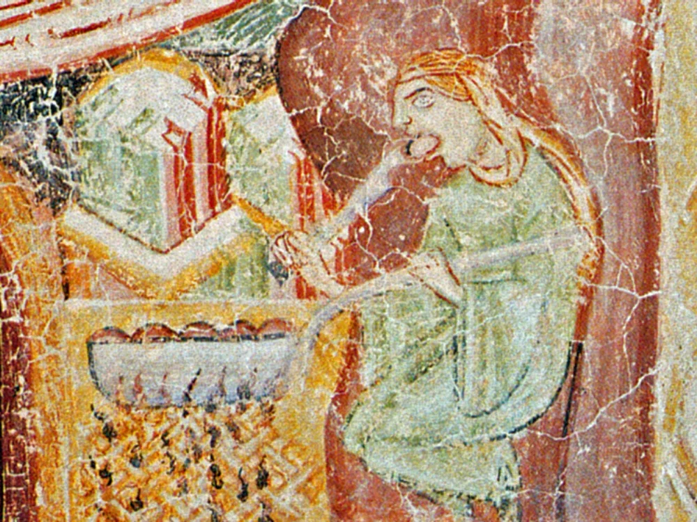 The knedlik eater in the frescoes of the chapel at Hocheppan Castle/Wikimedia Commons 