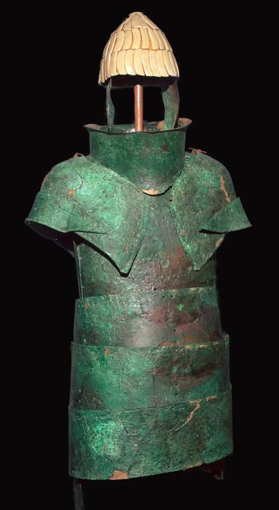 Set of Mycenaean armour from Dendera, composed of a bronze cuirass and boar's tusk helm, c16th century BC/Photo by CM Dixon/Print Collector/Getty Images