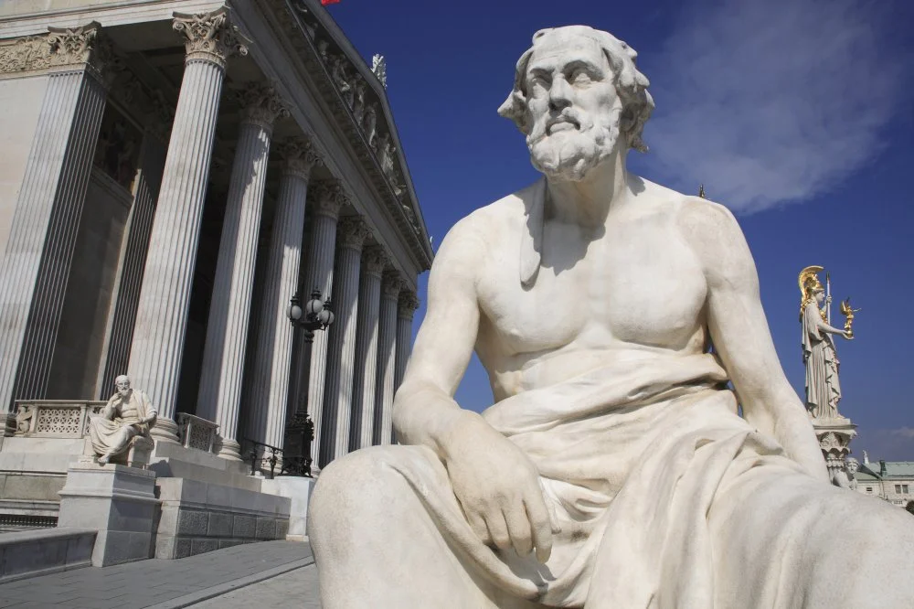 Austria, Vienna, Statue of Thucydides the Greek philosopher in front of Parliament building/Getty Images