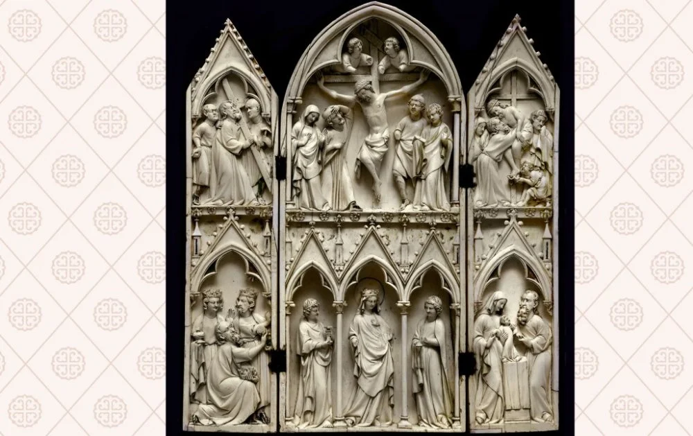 The tricuspid portable altar "The Virgin in Glory" from the church of Saint-Sulpice du Tarn. Paris. The end of the 13th century. Ivory. The Cluny Museum / /Alamy