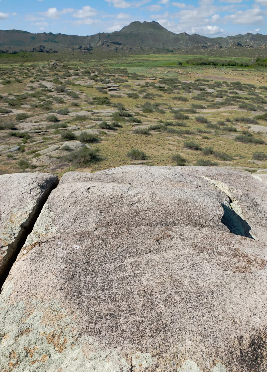 The cliff with the lattice offers a view of the sacred mountain Kokentau/Olga Gumirova