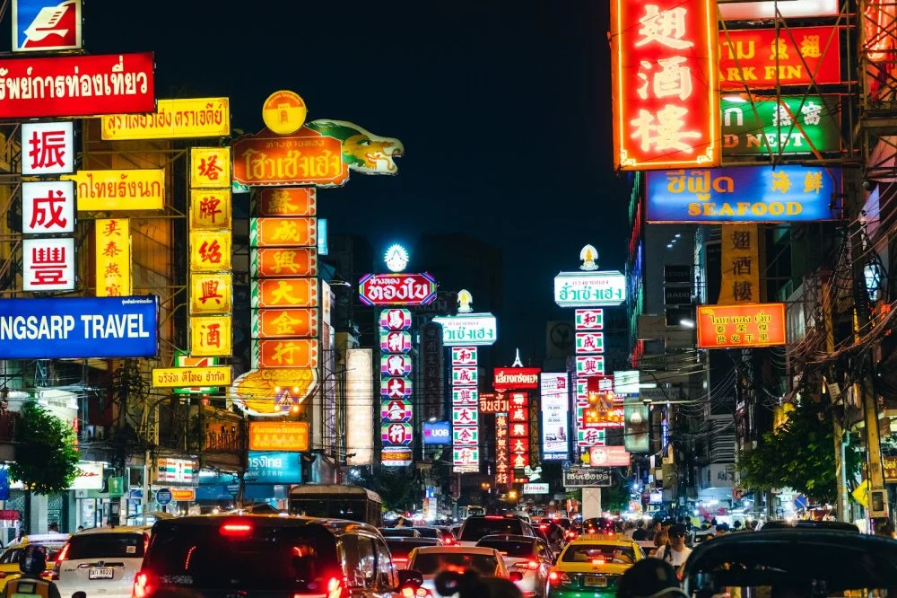 CHINATOWN BANGKOK THAILAND - 01/05/2019 : Very crowded tourist sightseeing at China town ''Yaowarat"" road famous street food market and wonderful night light/Shutterstock