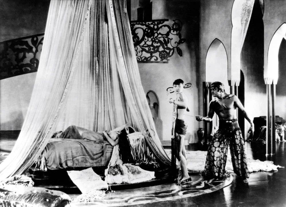 Julanne Johnston, Anna May Wong and Douglas Fairbanks Sr. In the Thief of Bagdad in 1924. Director Raoul Walsh/Alamy