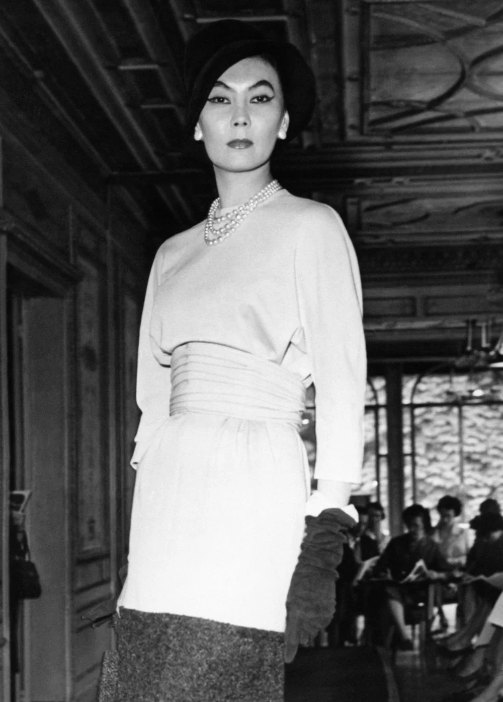 Alla wearing a tunic of yellow wool tightened at the waist by a wide belt, in Paris, France, on May 28, 1958./Gamma-Rapho/Getty Images