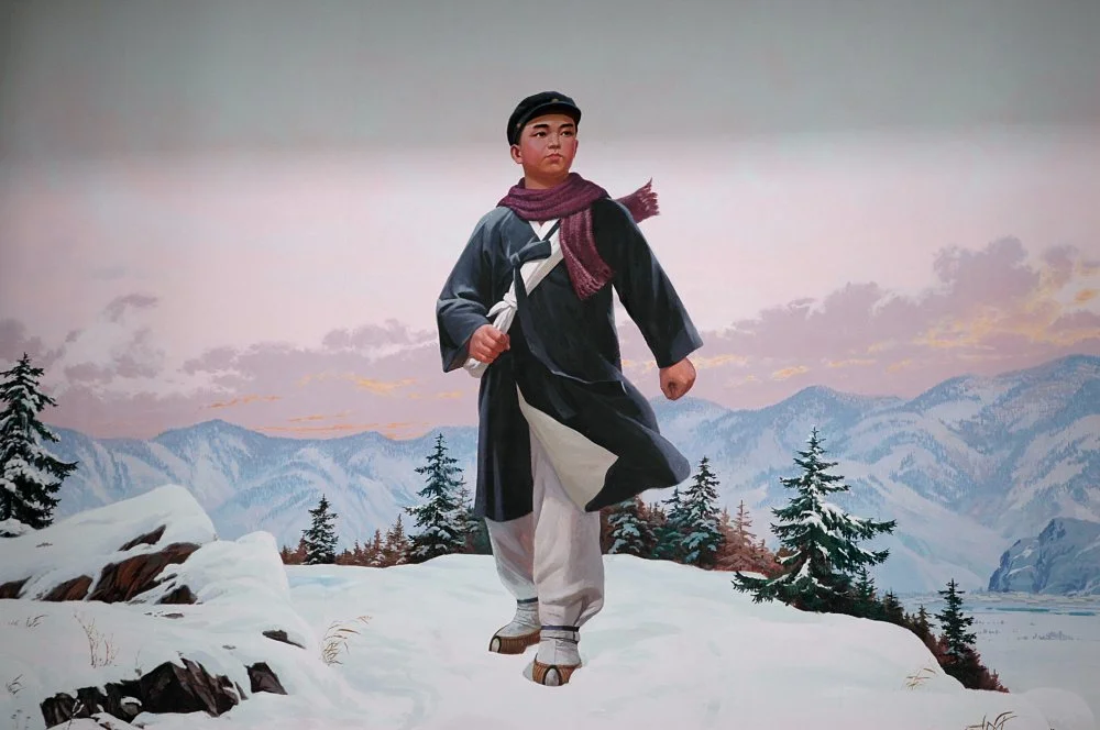 Ким Ир Сен в подростковом возрасте на фреске/Alain Nogues/Getty Images