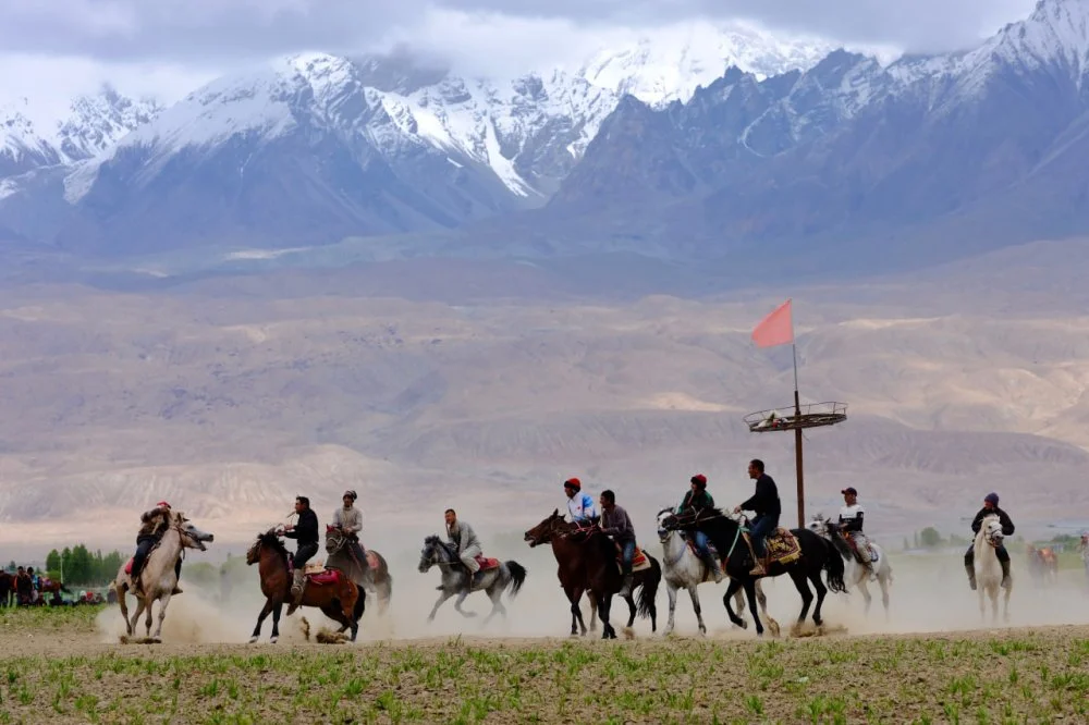 KASHGAR, CHINA - JUNE 20: Horsemen of the Tajik ethnic group vie for a goat during a goat grabbing competition on June 20, 2024 in Tashkurgan Tajik Autonomous County, Kashgar Prefecture, Xinjiang Uygur Autonomous Region of China/ Ding Xiaochun/VCG via Getty Images