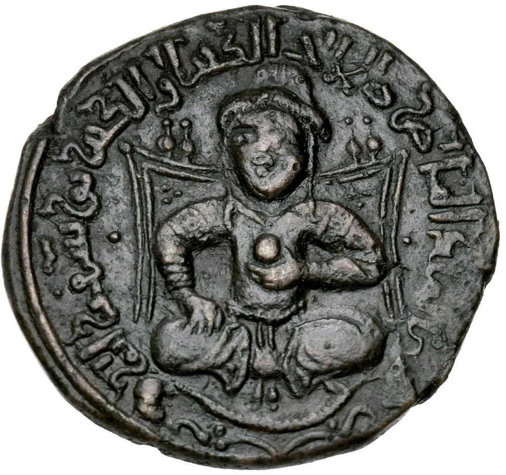 Saladin in the sharbush hat of Seljuk rulers, his rallying sign,on a coin: "The Victorious King, Righteousness of the World and the Faith, Yusuf ibn Ayyub (1190–1191 CE))/Wikimedia commons