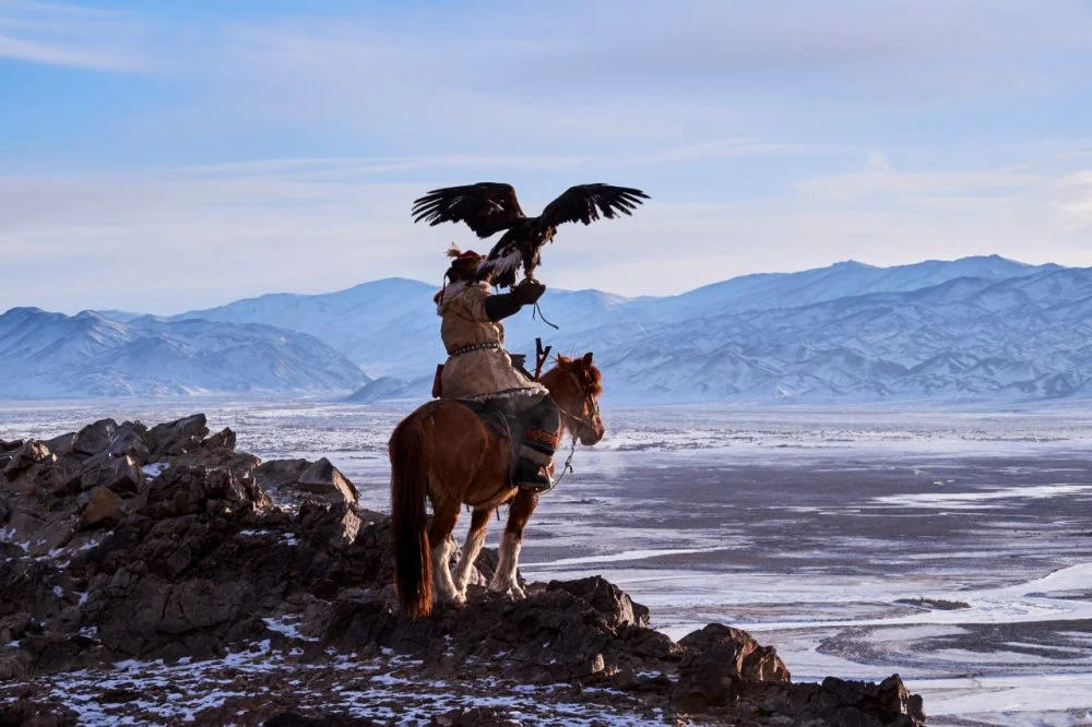 Kazakh eagle hunter. Mongolia, Bayan-Olgii province, Altai mountains/Getty Images