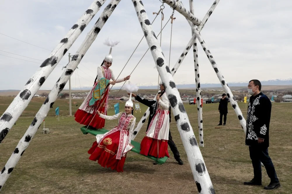Алтыбакан. Празднование Наурыза. 23 марта  2021 года / Getty Images 