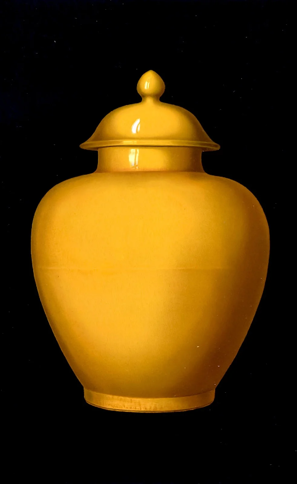 IMPERIAL YELLOW JAR. (Kuan), nine inches high without the cover, enameled with a monochrome glaze of imperial yellow. Made in the reign of K'ang-hsi (1662- 1722), of the great Ch'ing dynasty From the book ' ORIENTAL CERAMIC ART COLLECTION OF William Thompson Walters ' Published in 1897/Alamy