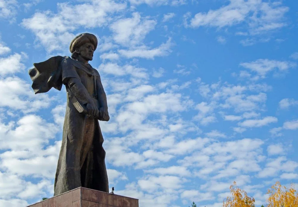 Almaty, Kazakhstan - 22 Oct 2019: View of monument to Al Farabi in campus of Kazakh National University/Shutterstock