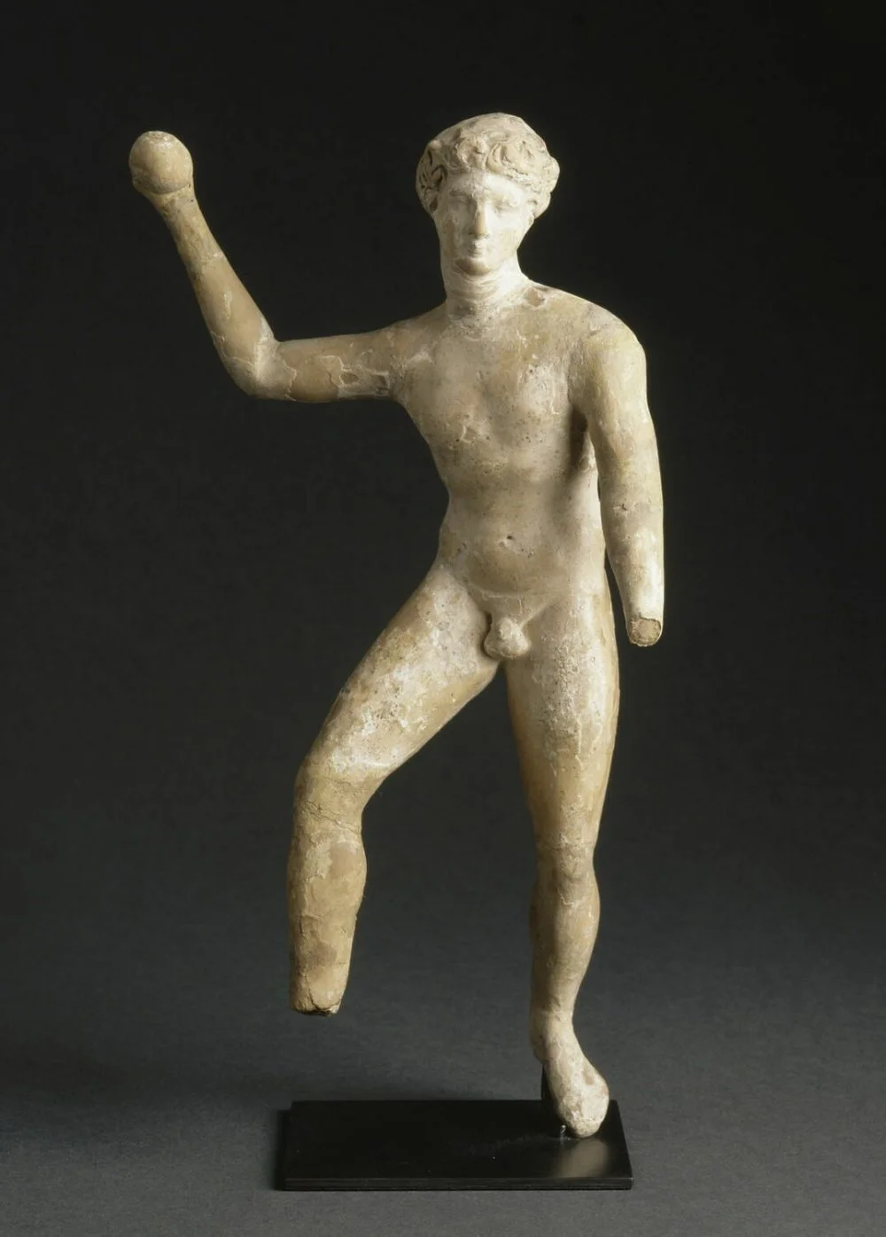 Ballgame player. Terracotta figurine made in Corinth, 3rd century BC. From Corinth/Musée du Louvre